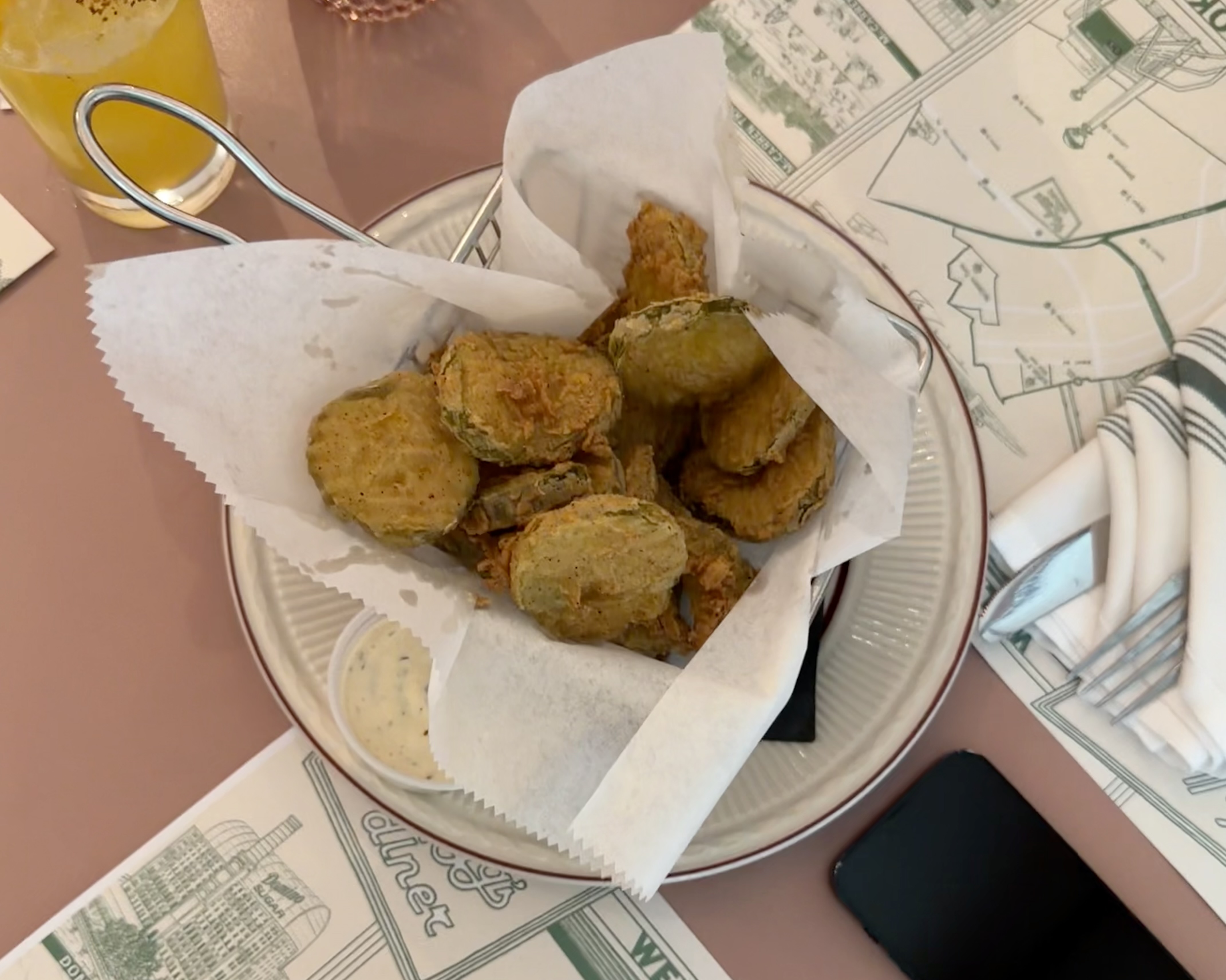 A basket of giant fried pickles at the diner